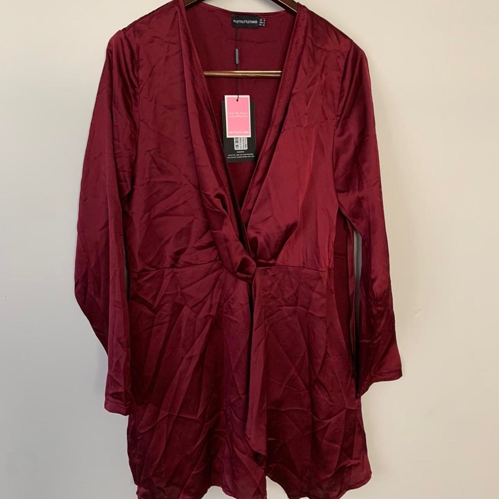 size 12 pretty little thing dress
well above the knees
satin material